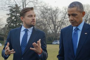 Leonardo DiCaprio with President Obama. For two years, Leonardo DiCaprio has criss-crossed the planet in his role as UN messenger of Peace on Climate Change. This film, executive produced by Brett Ratner and Martin Scorsese, follows that journey to find both the crisis points and the solutions to this existential threat to human species. The climate change feature documentary ‘Before the Flood’ airs globally on the National Geographic Channel October 30.  (photo credit: © 2016 RatPac Documentary Films, LLC and Greenhour Corporation, Inc.)